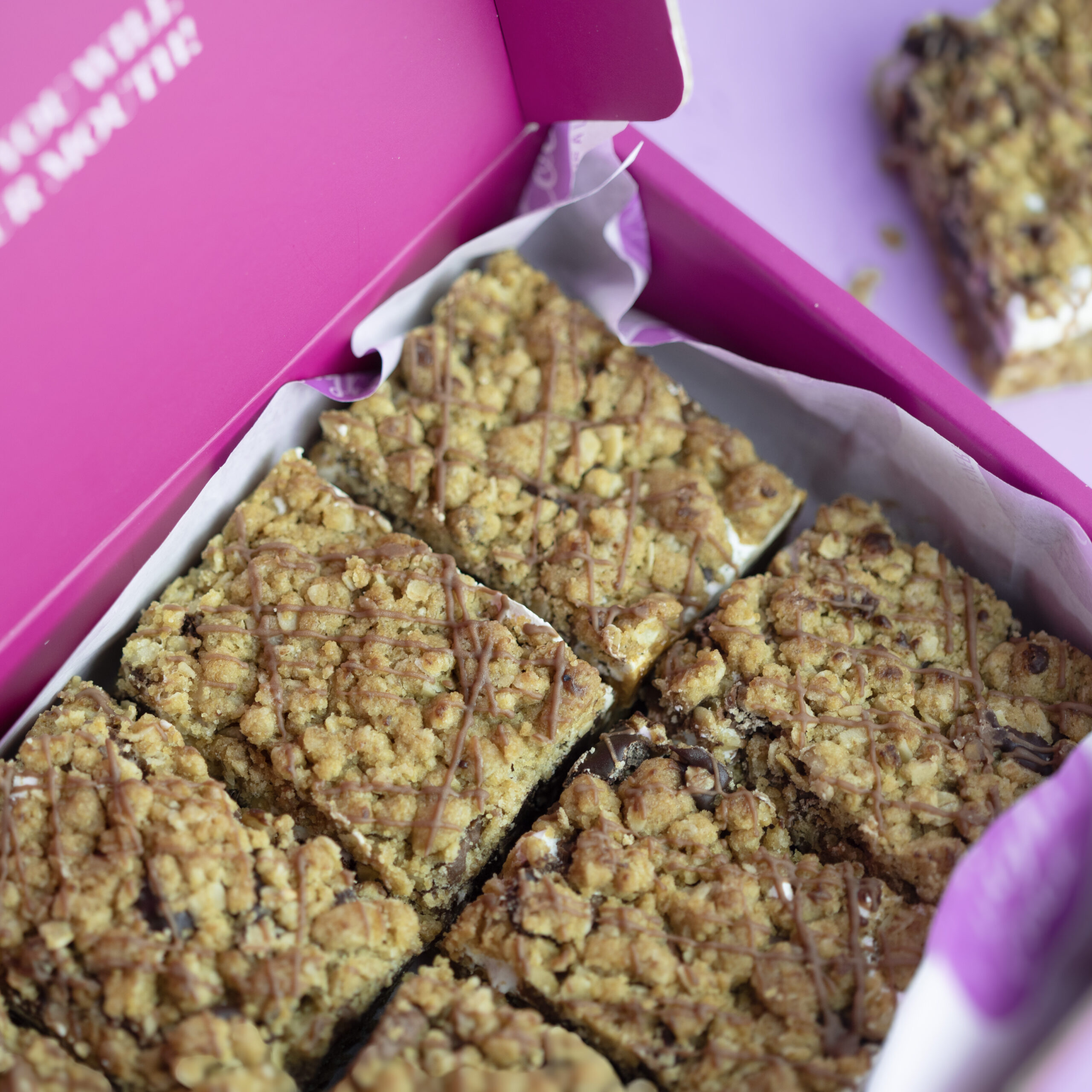 Gooey Marshmallow Crumble slice with caramel layer and Belgian chocolate