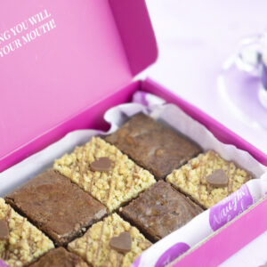Premium packaged box of salted fudge brownies and triple chocolate crumbles